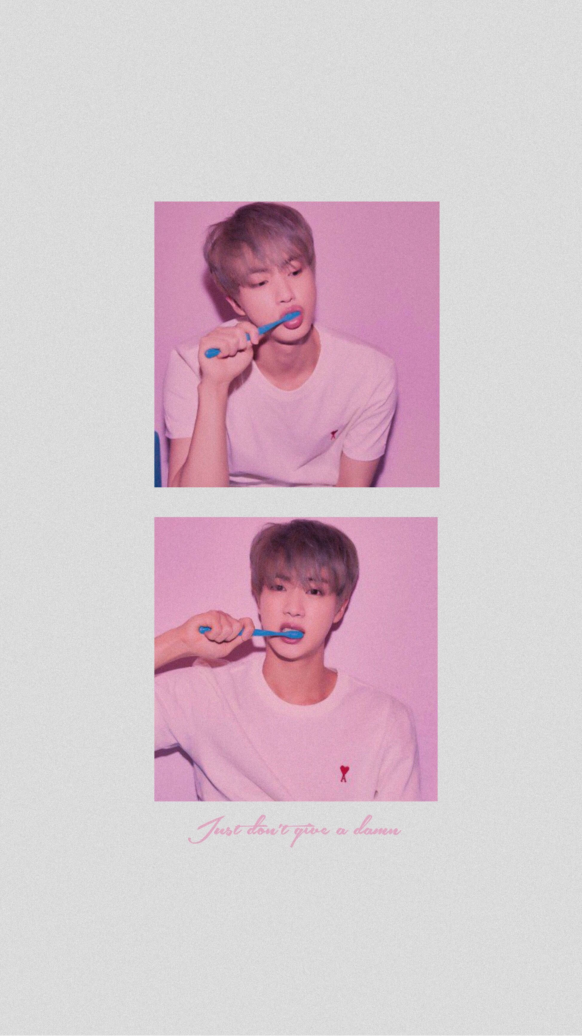 Oulike BTS Jin wat tande borsel Muurpapier