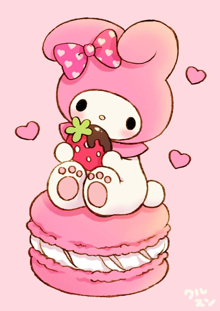 Oulike My Melody wat Aarbeie op Macaron Eet Muurpapier