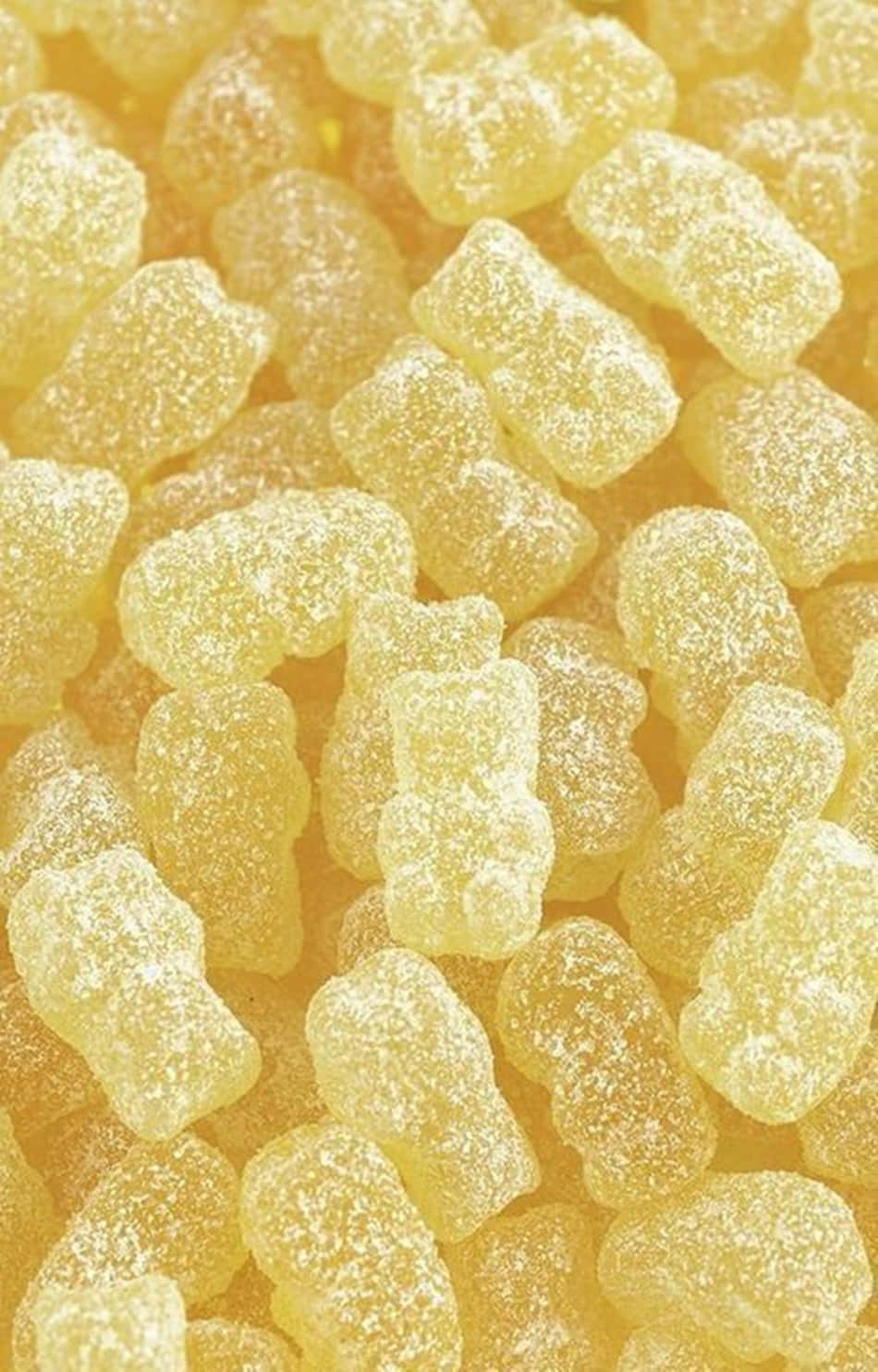 Oulike Pastelgeel Gombeertjies Muurpapier