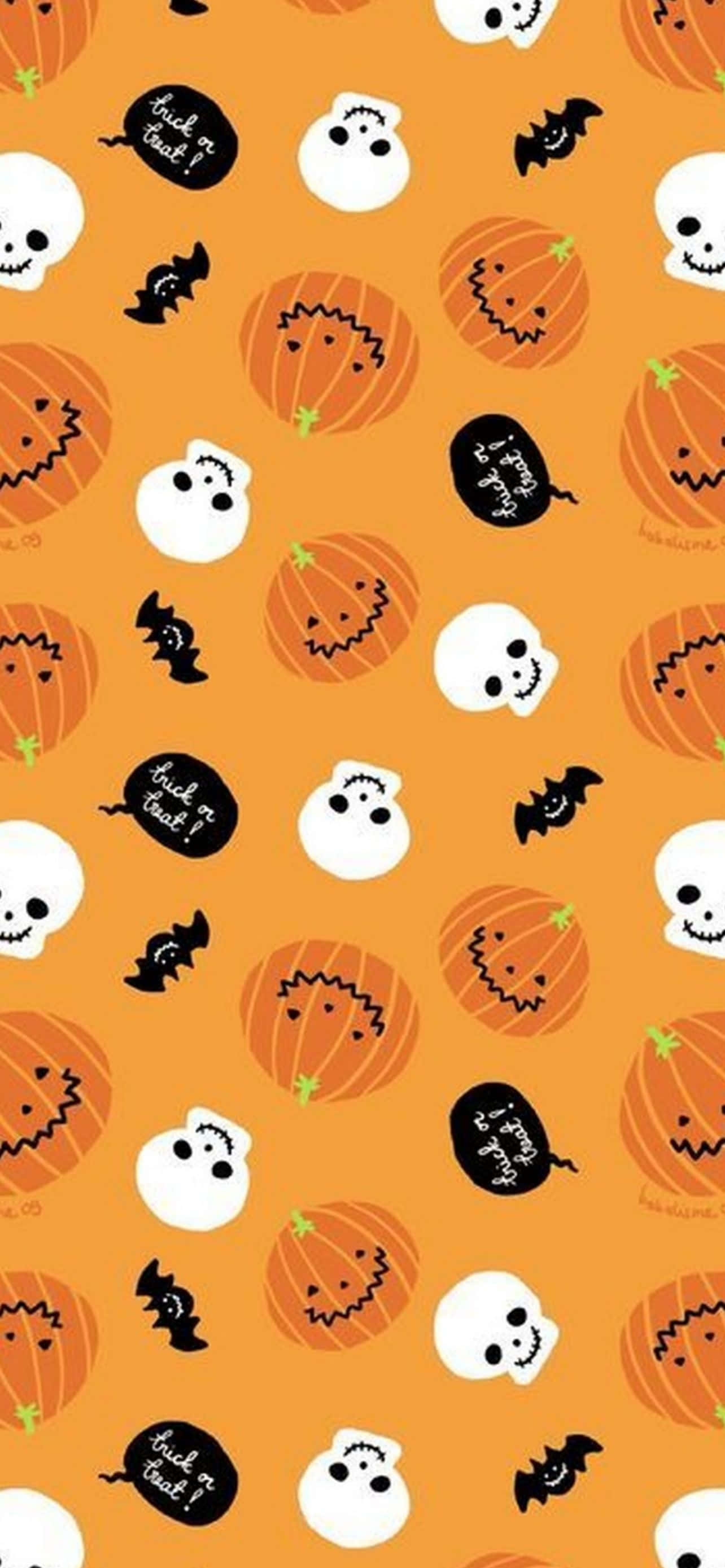pampoene en skedels vir halloween op 'n oranje agtergrond Muurpapier