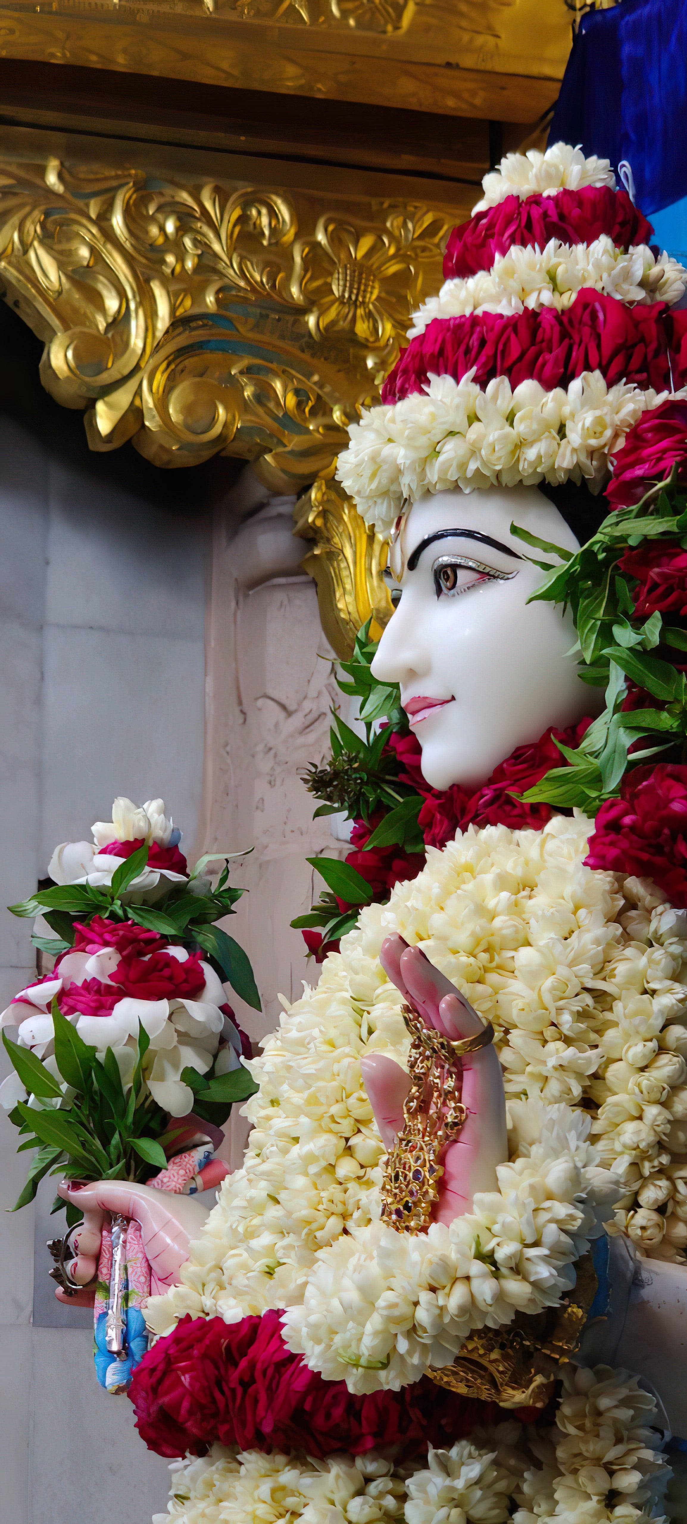 Pragtige Krishna Maharaj-standbeeld Muurpapier