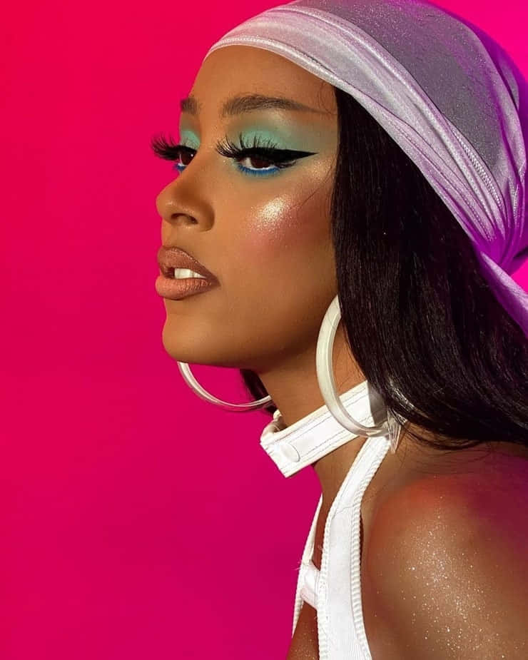 R&B-sangeres Doja Cat wat optree op die verhoog Muurpapier