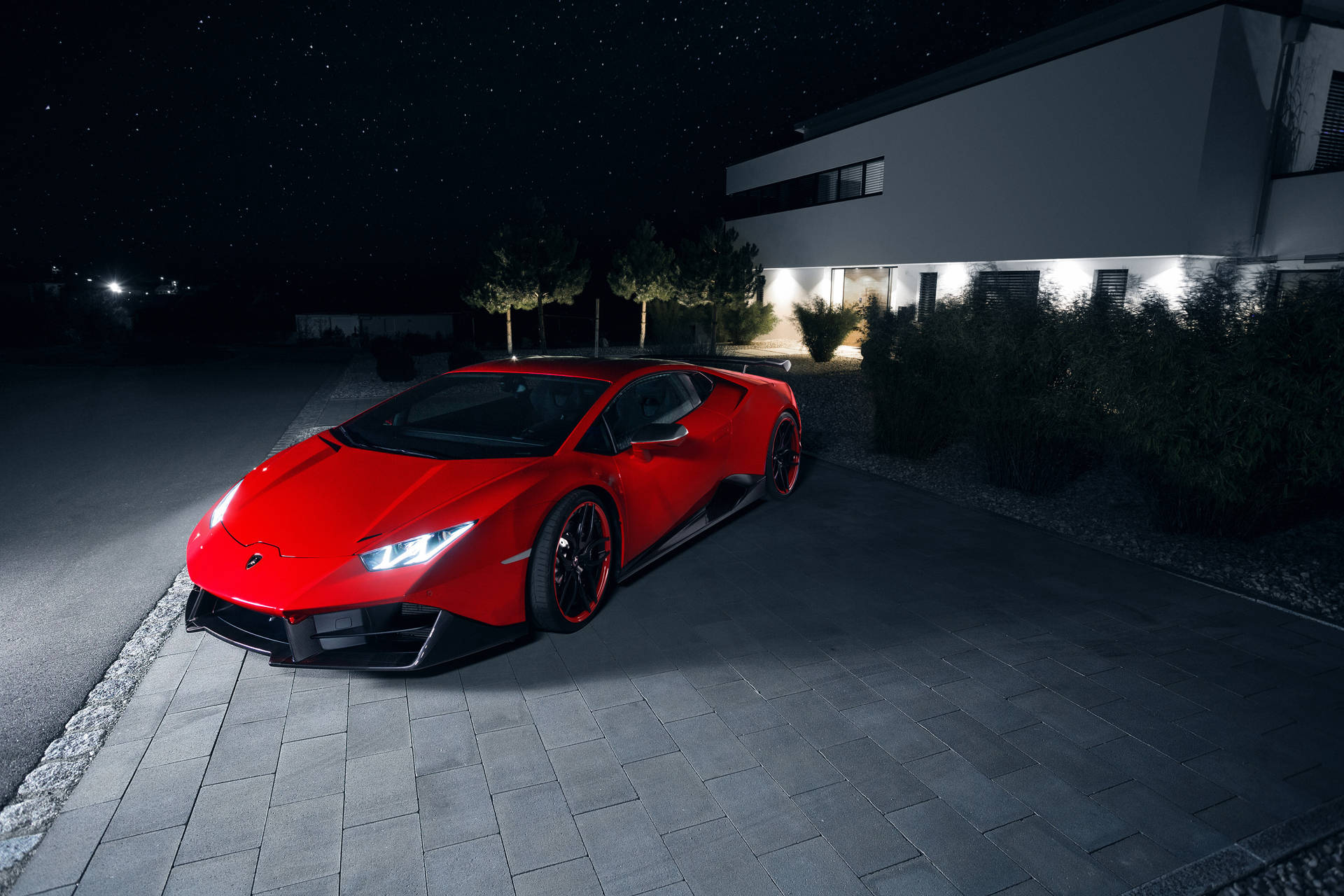 Rooi Lamborghini Huracan snags-agtergrond.