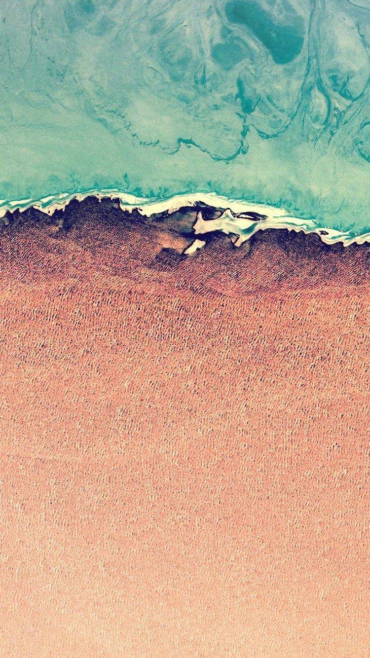 Seewater en Oranje Sand Skildery iOS 12 Muurpapier