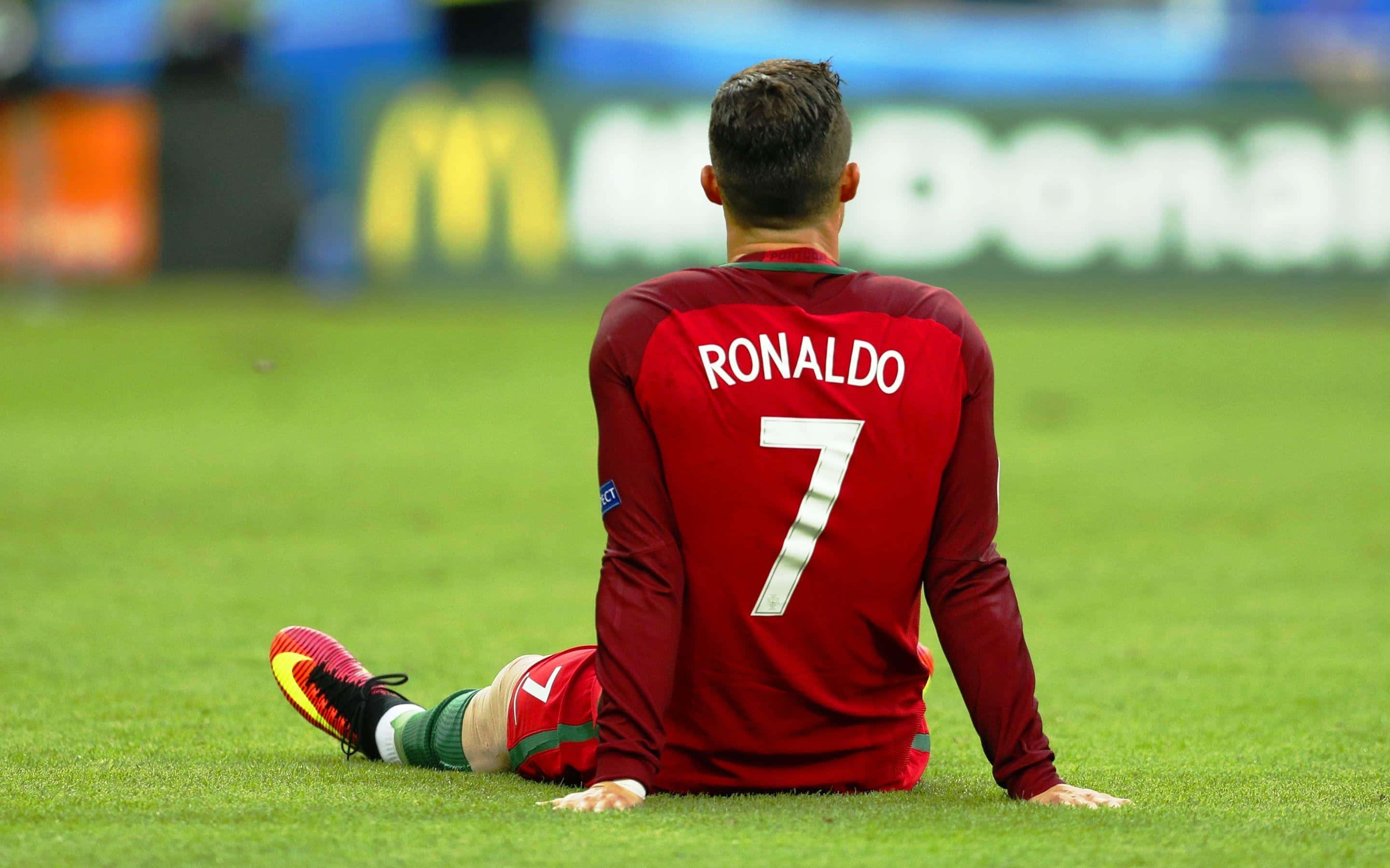 Sokkerspeler Cristiano Rolando Prent Muurpapier
