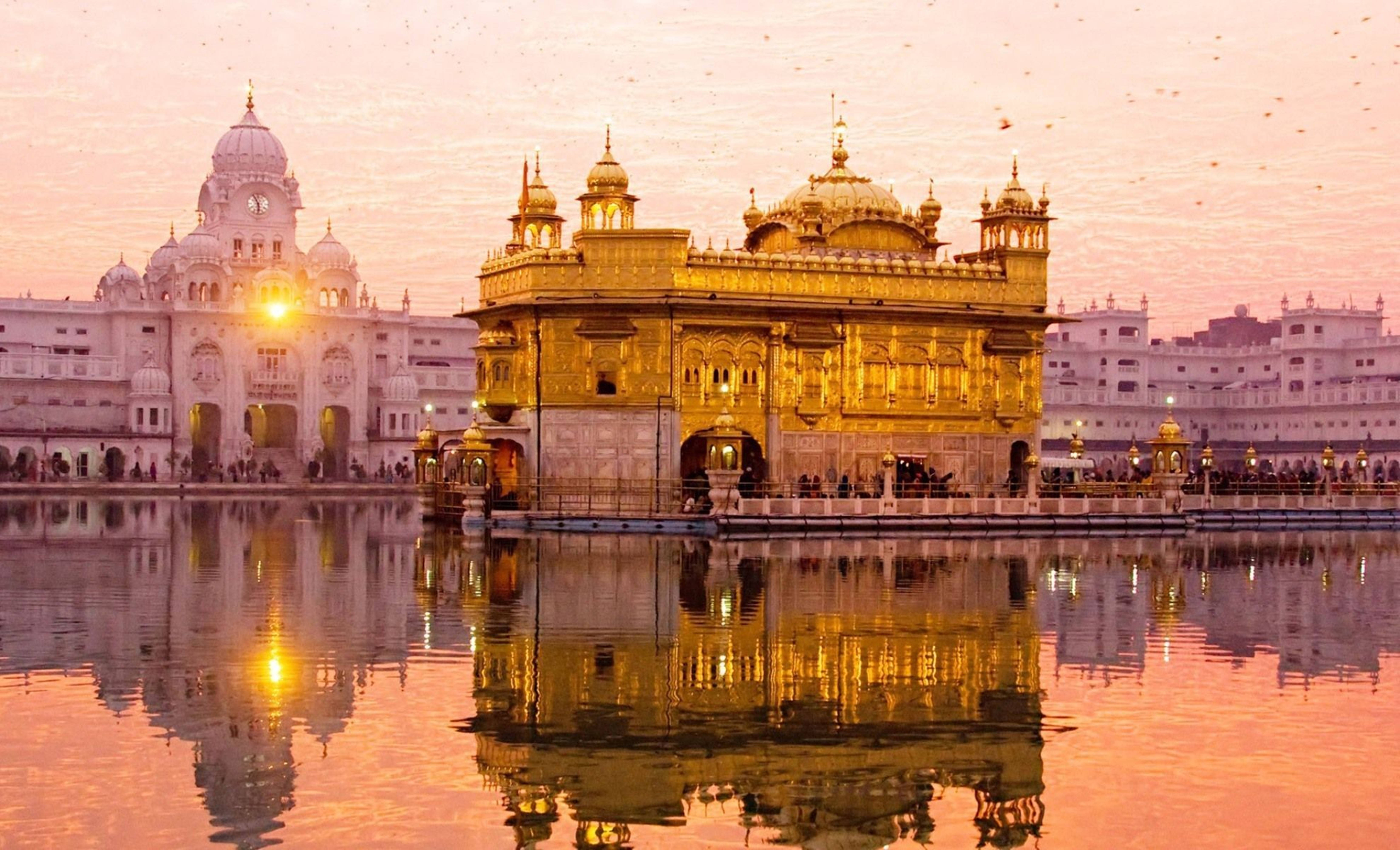 Sonsondergang by Amritsar se Goue Tempel HD Muurpapier