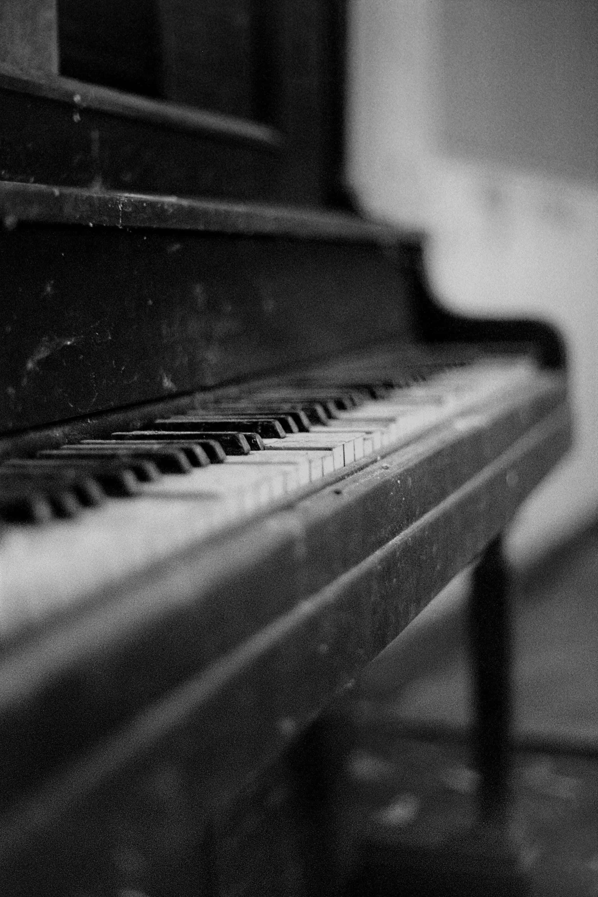 Speel die soet melodieë van 'n Vleuelklavier Muurpapier