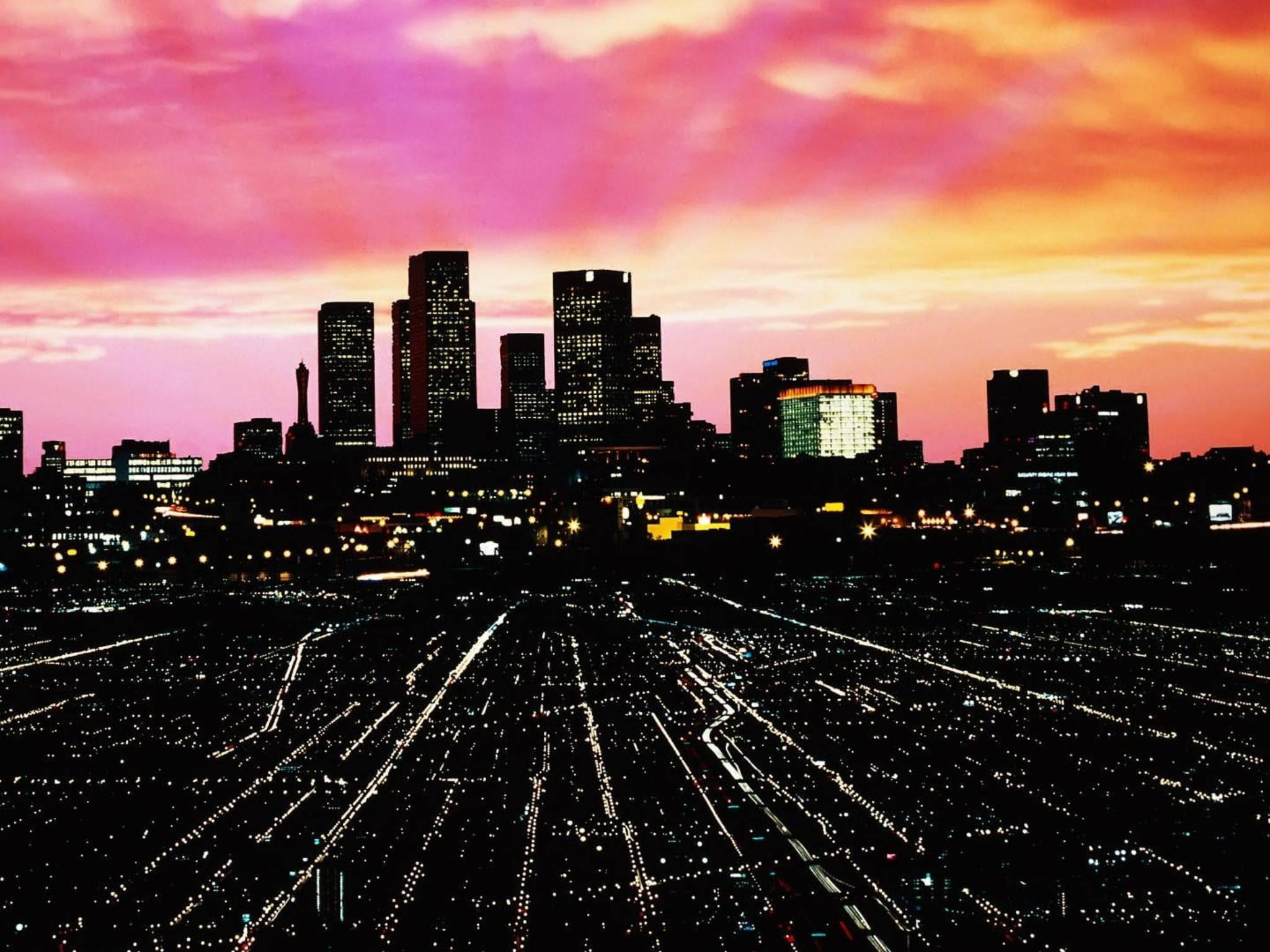 Stedelike Sonsondergang in Los Angeles Muurpapier