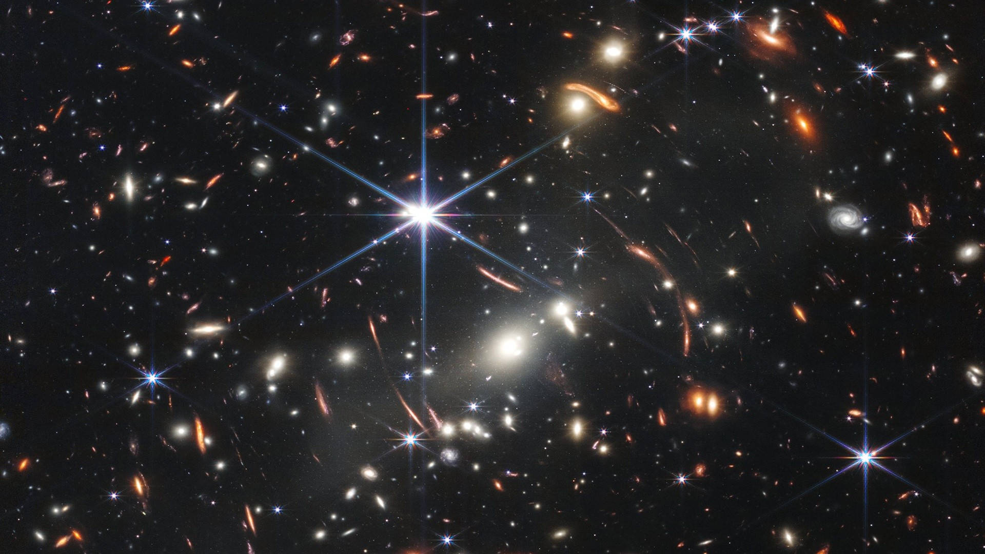 Sterrestelselswerm in die Ruimte Universeel Muurpapier
