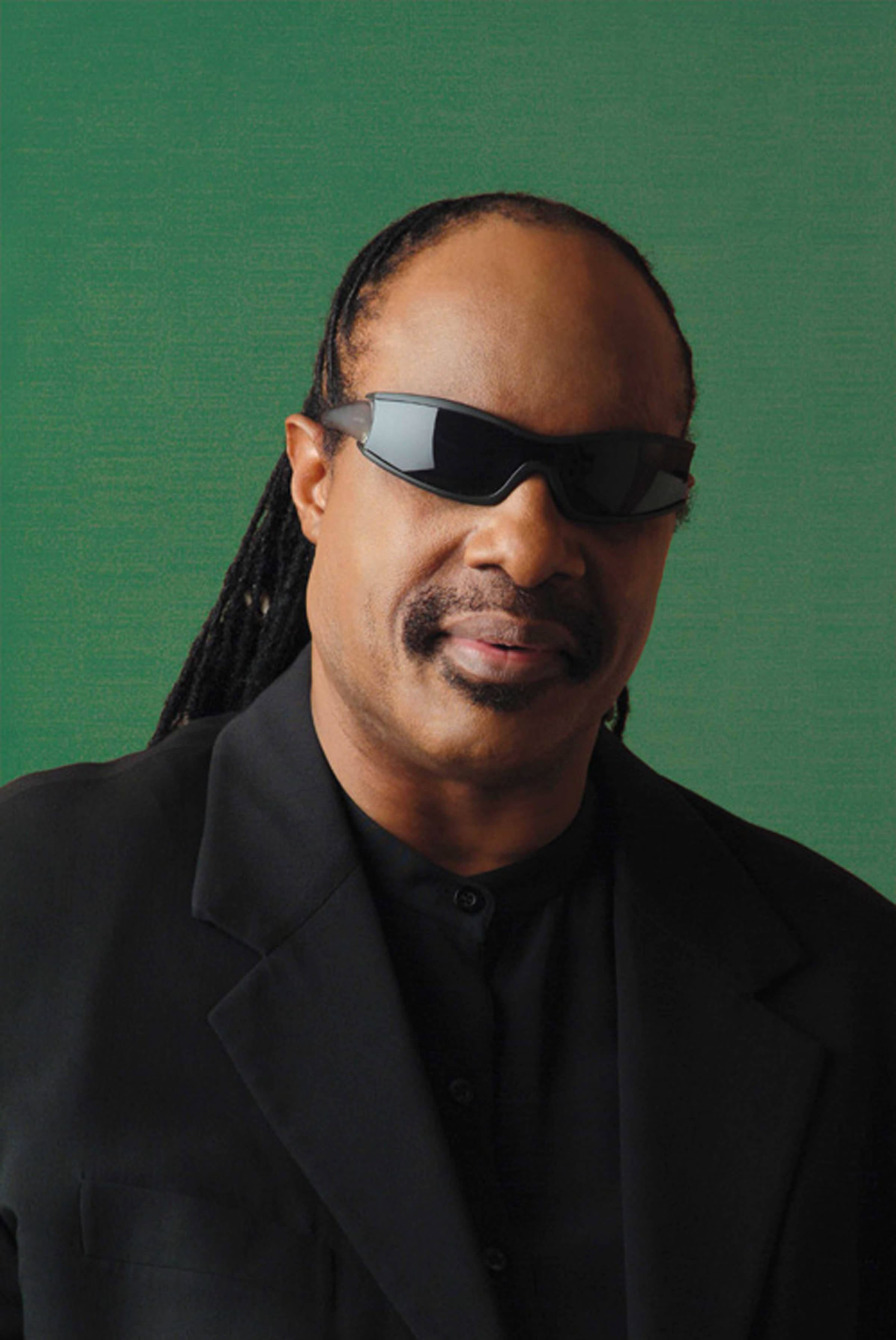 Stevie Wonder Groen Agtergrond Muurpapier