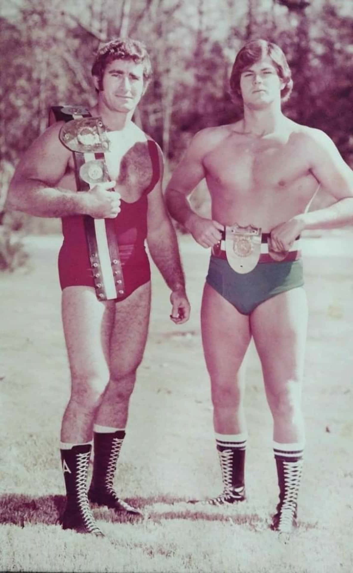 Stoeiers Bob Armstrong en Robert Fuller Vintage Volskoot Muurpapier