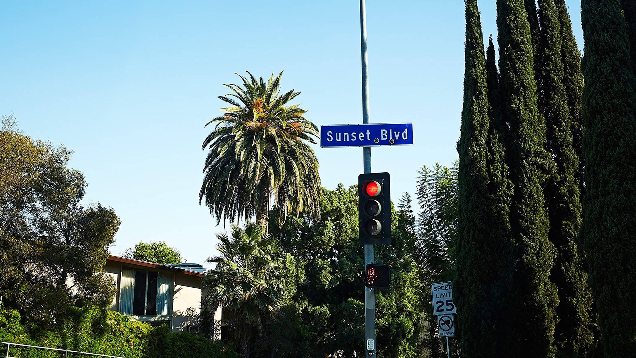 Sunset Boulevard Blou Naambord Muurpapier