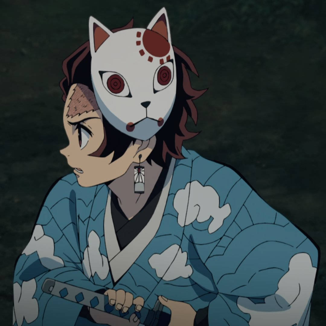 Tanjiro wat Demoonvegermasker dra Muurpapier