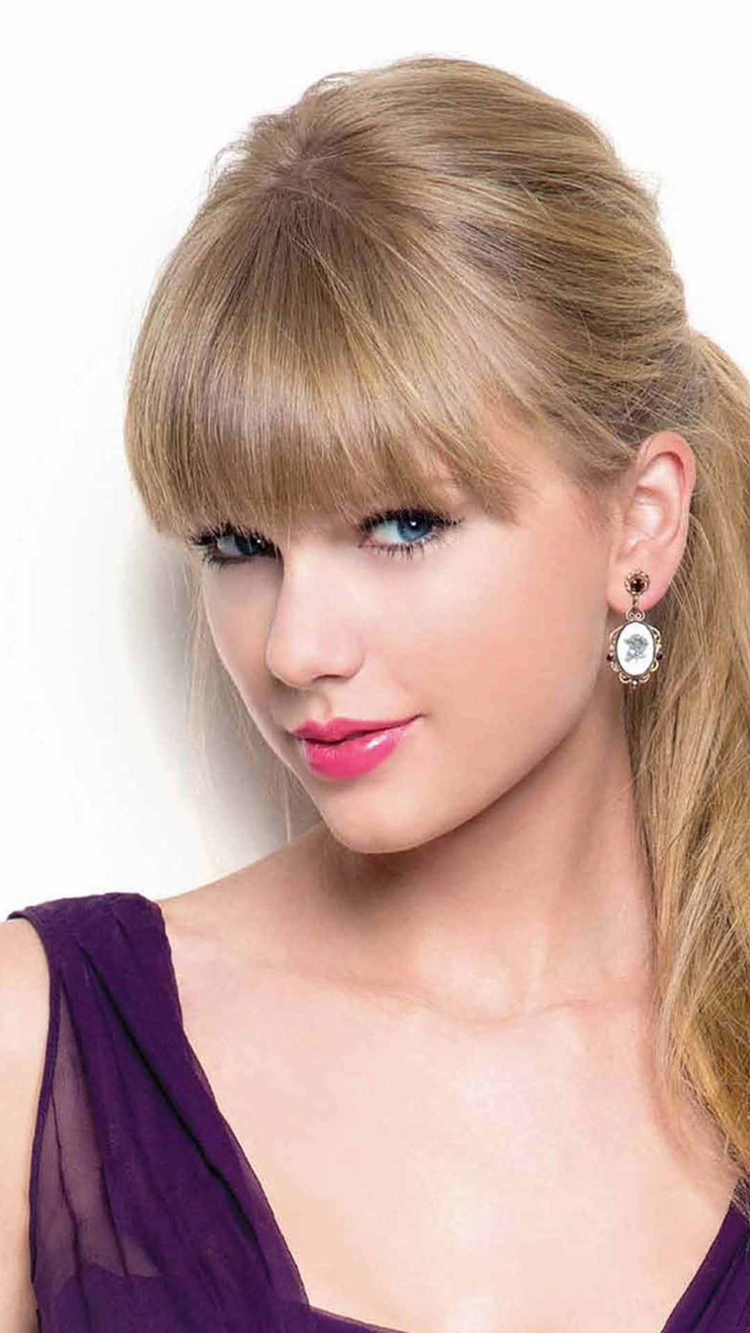 Taylor Swift Glimlag iPhone Muurpapier