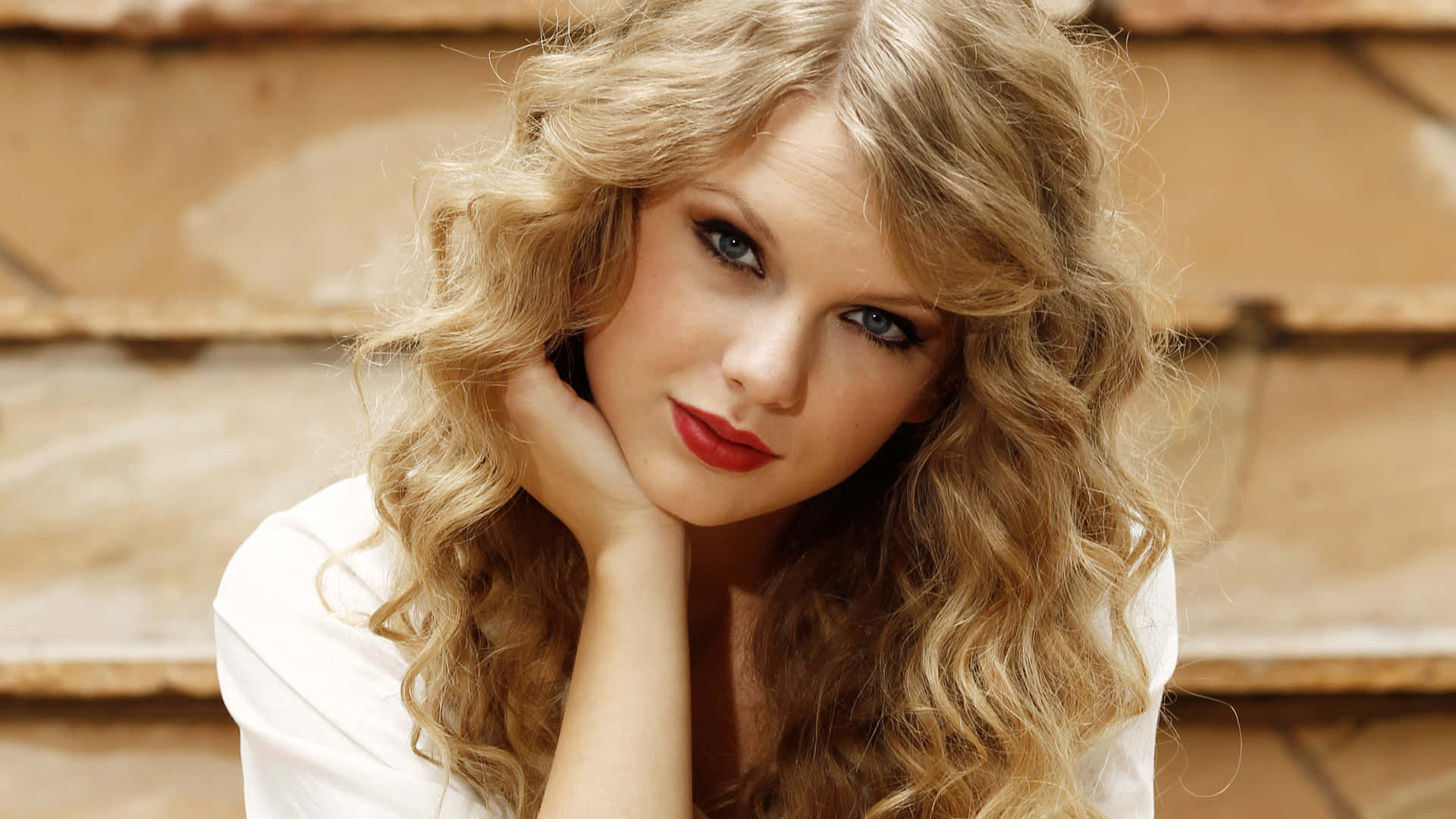 Taylor Swift wat foutloos optree by die Sencit Musiekfees. Muurpapier