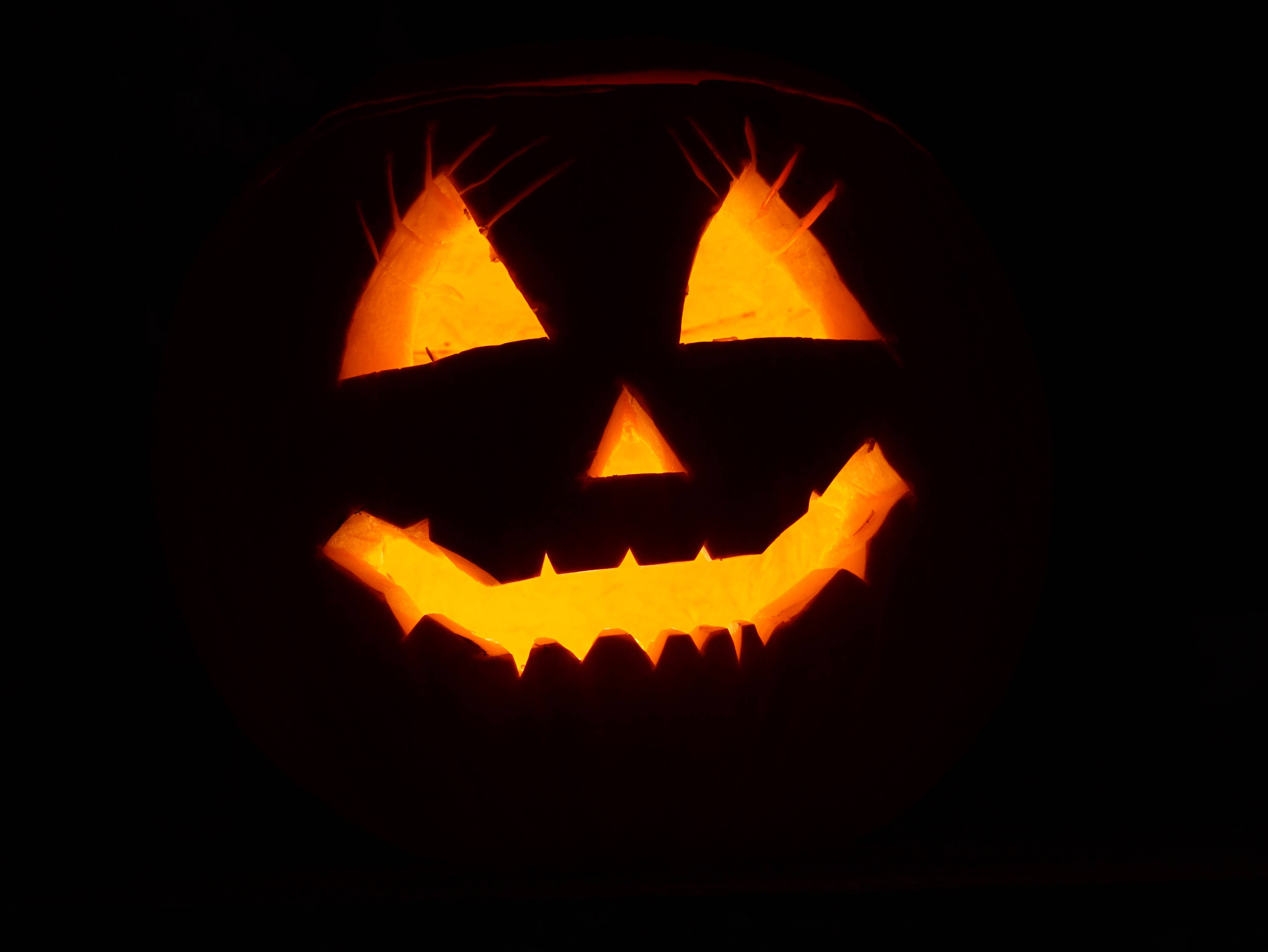 Trick or Treat - Vier Halloween met 'n Swart Pampoen Muurpapier
