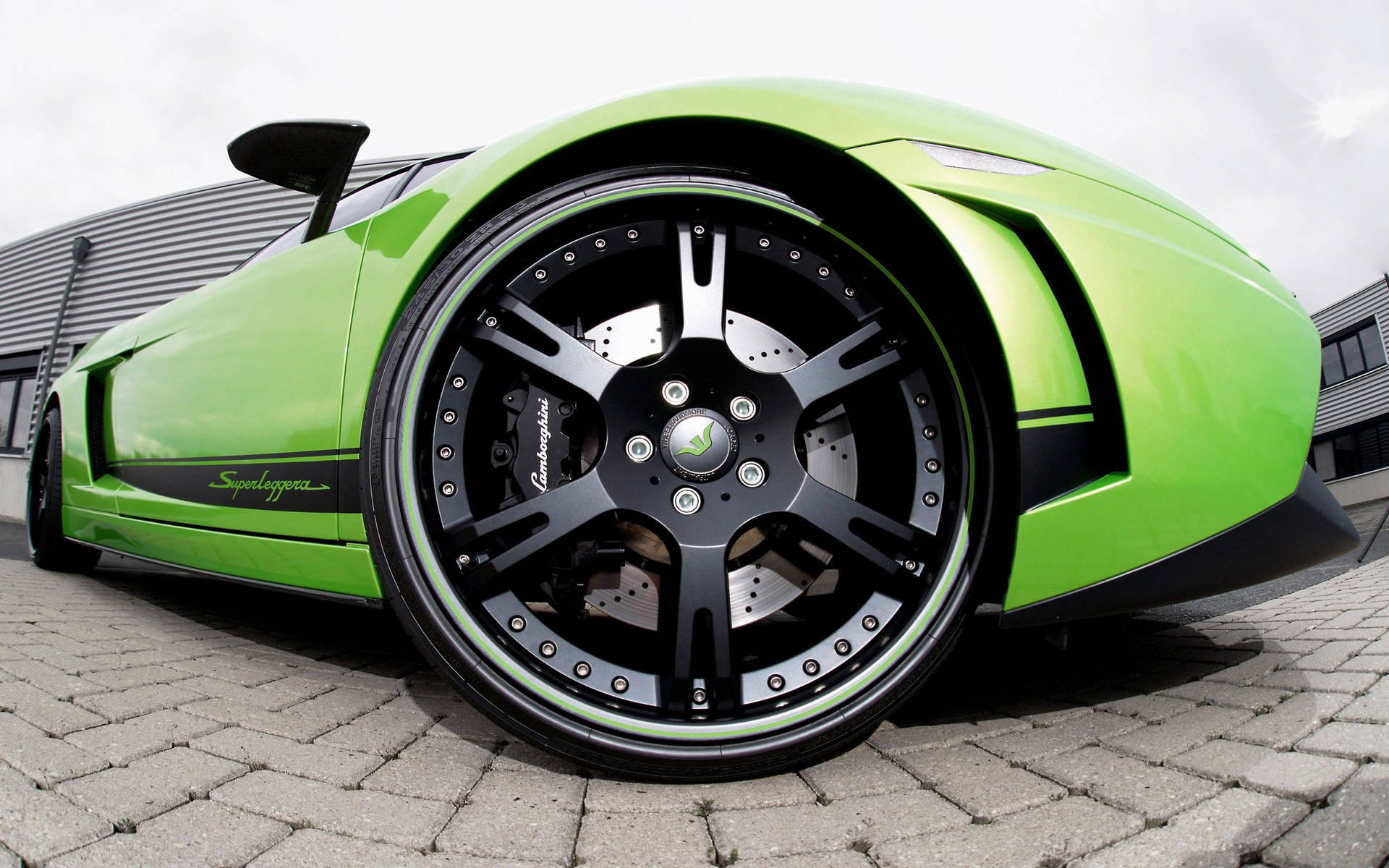 Groen Lamborghini wiel vissogkyk agtergrond.