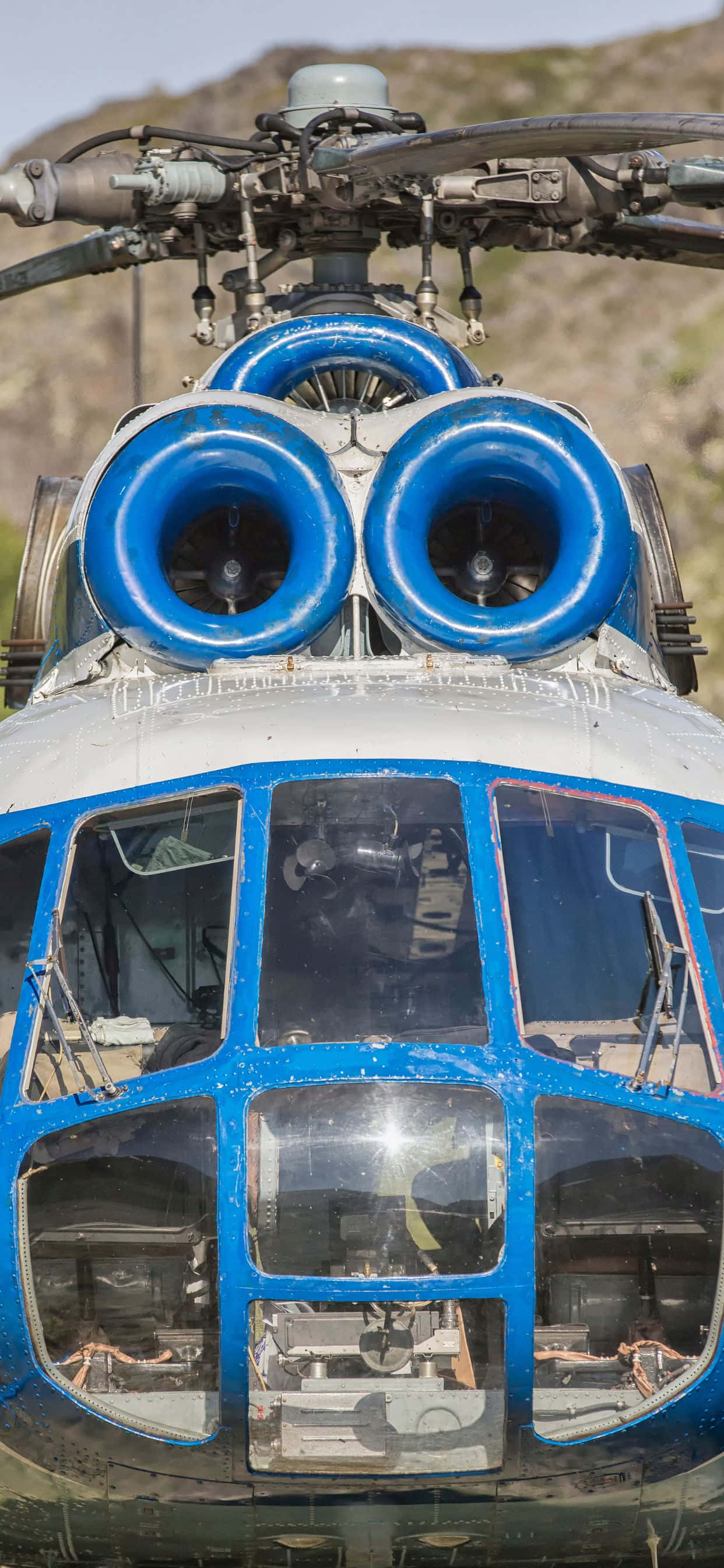 Verken die Wêreld met die Nuutste iPhone Xs Max Helikopters Muurpapier
