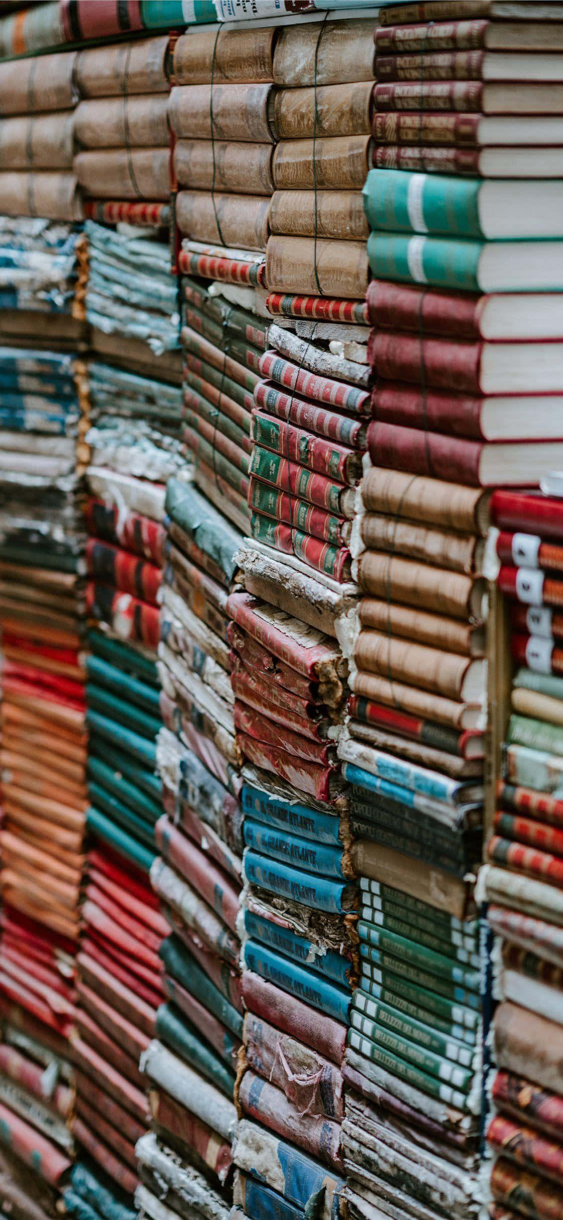 Verken Nuwe Idees met 'n Boeke iPhone Muurpapier