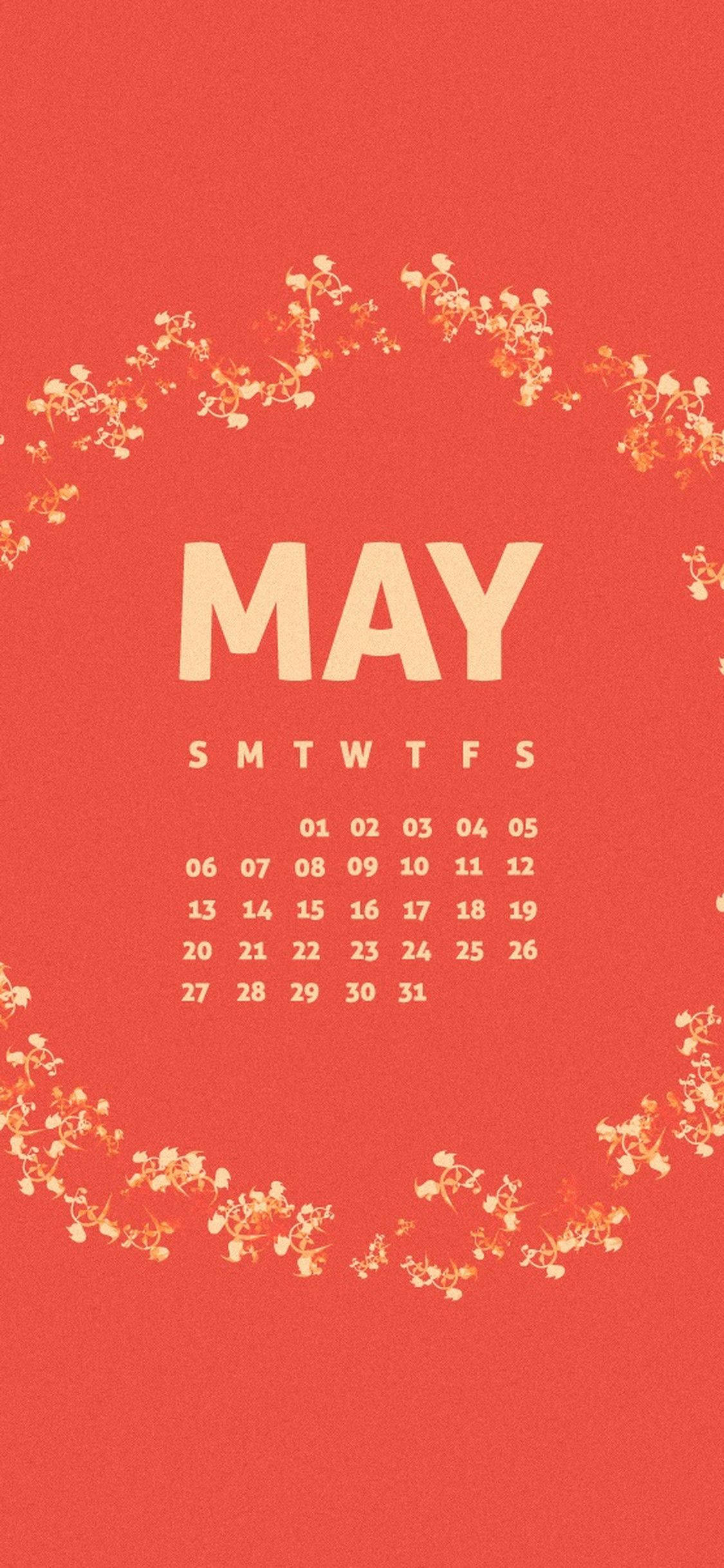 Vier die skoonheid van Mei met 'n rooi kalender vol lewendige blomme Muurpapier