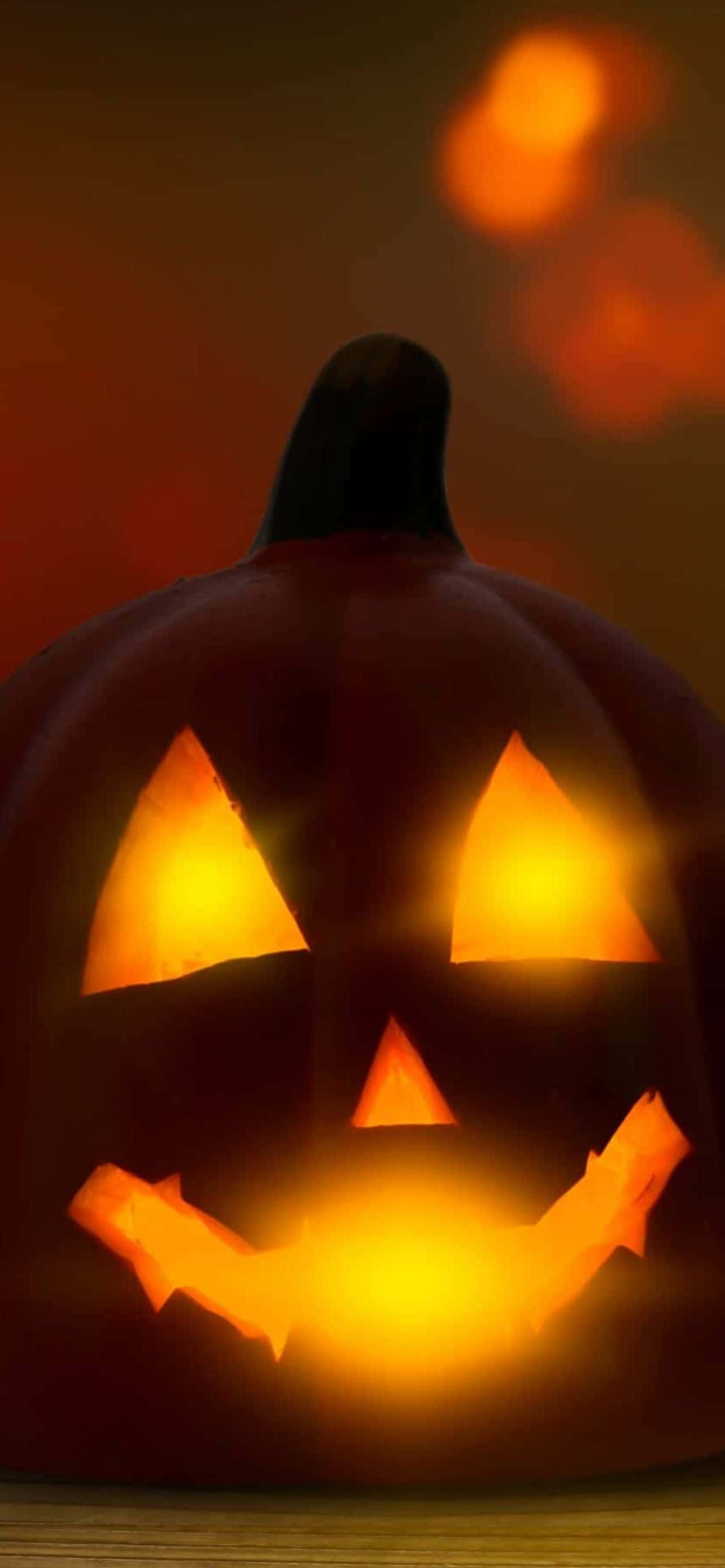 Voeg 'n Bietjie Griezelige Pret by jou Foon met 'n Stylvolle Halloween iPhone-agtergrond Muurpapier
