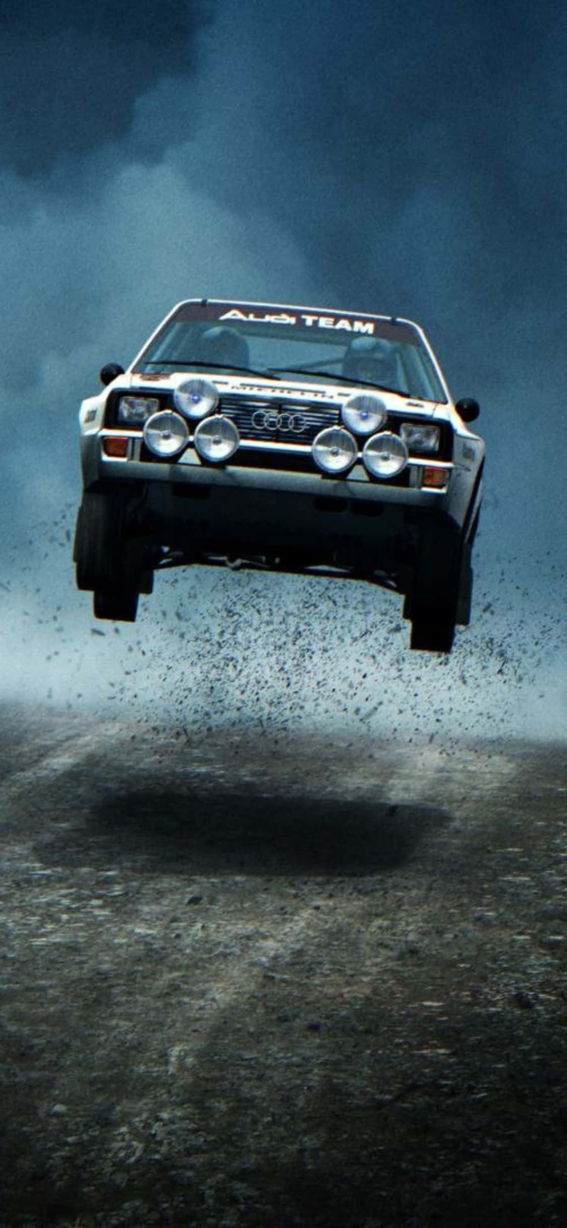 Voel die Opwinding met iPhone Xs Dirt Rally Muurpapier