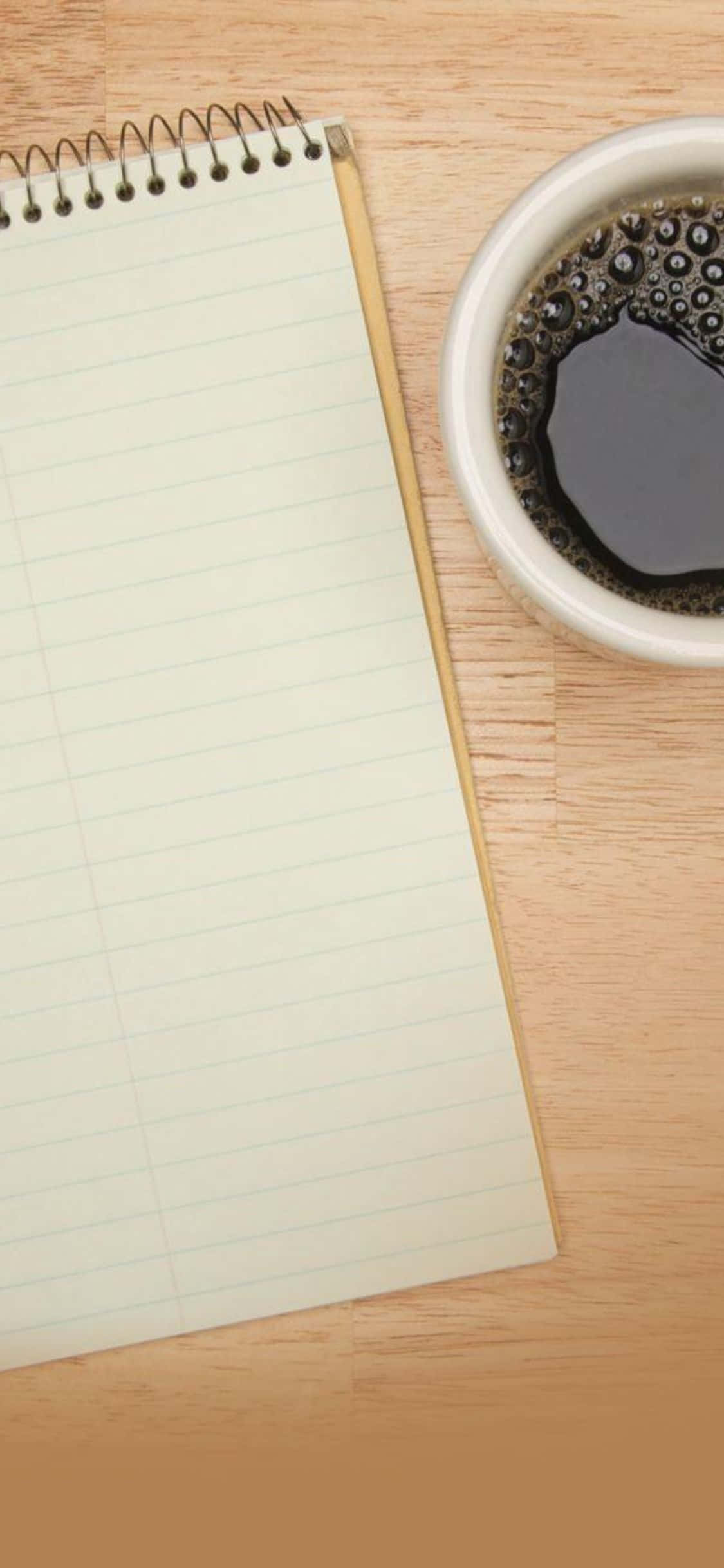 Werk moeiteloos met die nuwe iPhone Xs op jou lessenaar Muurpapier