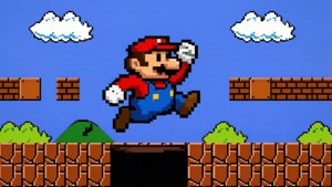 Pixelkuns Mario wat oor 'n put spring in 'n klassieke 8-bits Super Mario-vlak, retro en nostalgies. — Mario Muurpapier