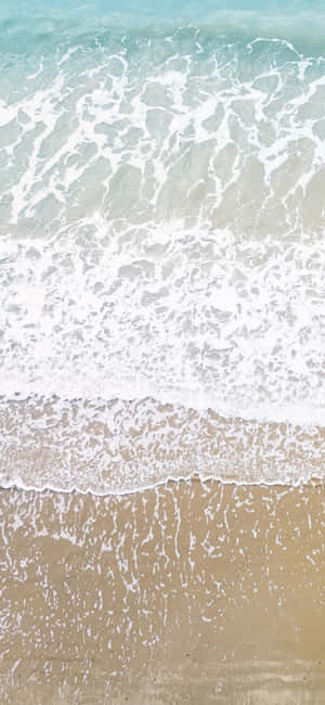 Boeiende iPhone X-agtergrond wat 'n opwindende strandformaat vasvang — Nokia Muurpapier