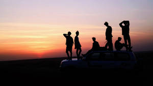 BTS-groepsfoto Sondergloed-agtergrond — Bts groep foto GIF Muurpapier