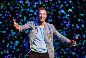 Chris Martin in Auckland-agtergrond — Dowwe Muurpapier