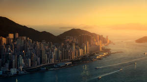 Pragtige Hong Kong stadslyn met sonsondergang-agtergrond. — 1600x900 Muurpapier