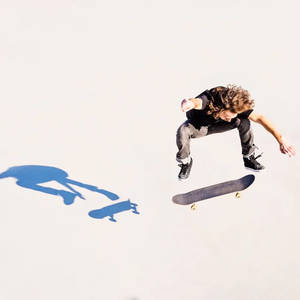 Estetiese skater seun skaduwee agtergrond