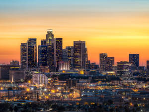 Geel Oranje Los Angeles Sonsondergang-agtergrond — Sononderlaan Muurpapier