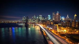Helder ligte stadsbeeld van New York muurpapier. — 3840x1080 Muurpapier
