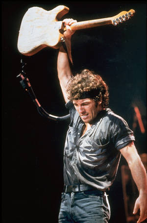 Ikoniese Rockster Bruce Springsteen wat lewendig optree — Xiaomi Pad 7 Ultra Muurpapier