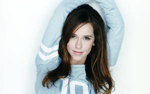 Jennifer Love Hewitt cheerleader-voorkoms agtergrond