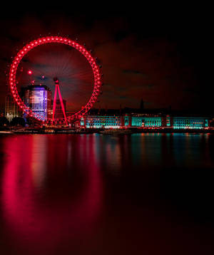 London Eye met sy pragtige glinsterende rooi ligte-agtergrond — Galaxy Z Vou Muurpapier