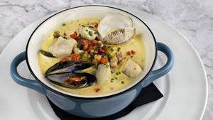 Mossels en clams chowder agtergrond — Gedemp Muurpapier