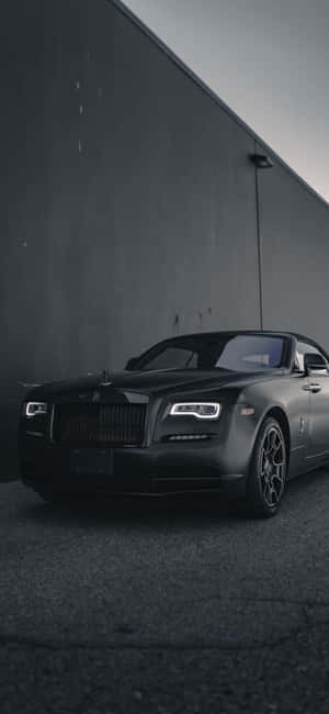 Onderskrif: Elegansie Gepersonifieer - Die Rolls Royce Phantom — Pixel 9 Pro Muurpapier