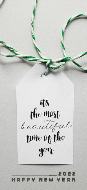 Onderskrif: Helder Begin - Gelukkige Nuwe Jaar 2022. — iPhone 13 Pro Muurpapier