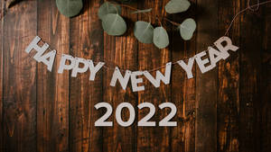Onderskrif: Vier Nuwejaar 2022 met Vuurwerkskerm — iMac Muurpapier