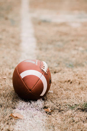 Amerikaanse voetbal varkvel bal selfoonagtergrond.