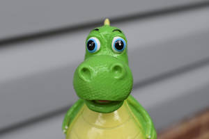 Oulike Dinosourus-speelding Vooraansig — Oulike dinosourus Muurpapier