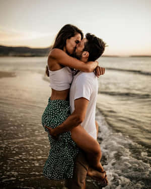 Paartjie by die Strand Prente