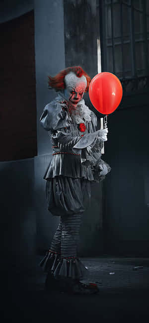 Pennywise-agtergrond — Huawei Mate 80 RS Ultimate Muurpapier