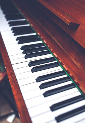 Piano klawerbord in houtraam agtergrond. — Oppo Pad 6 Muurpapier