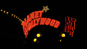 Planet Hollywood-tekens-agtergrond — Battery Saving Muurpapier