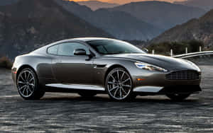 Pragtige Aston Martin DB9 in 'n elegante omgewing — Steam Deck OLED Muurpapier