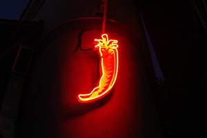 Rooi Brandrissie Neon Kuns agtergrond
